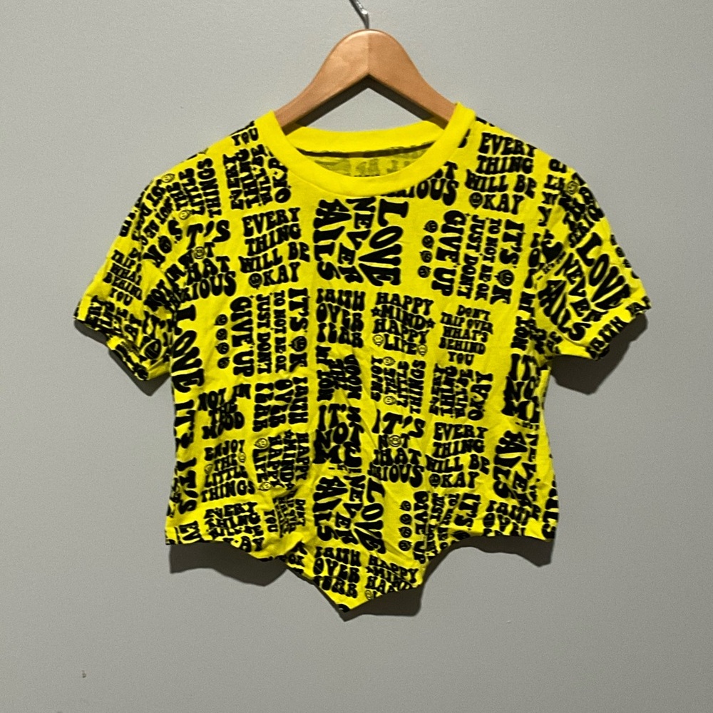 Yellow crop top with black lettering